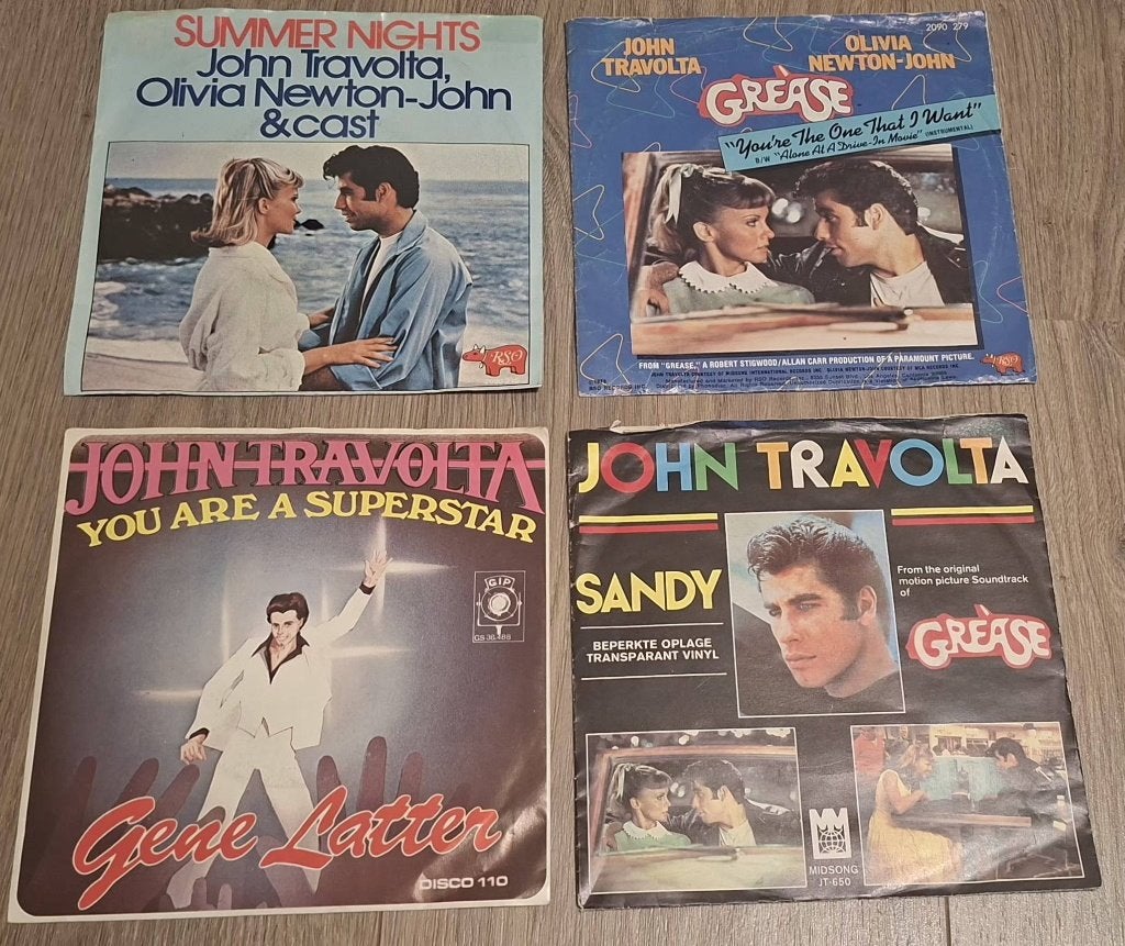 JOHN TRAVOLTA, Ophalen of Verzenden, Zo goed als nieuw