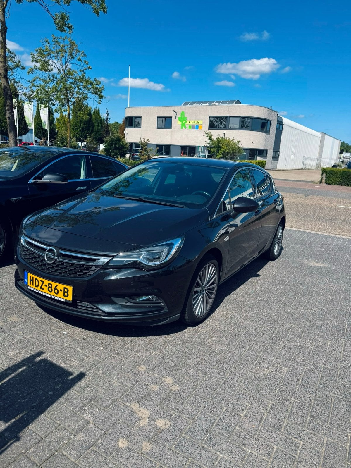 Opel Astra 1.4 Turbo 110KW 5D AUT 2016 Zwart, Auto's, Opel, Zwart, 4 cilinders, Leder en Stof, Zwart