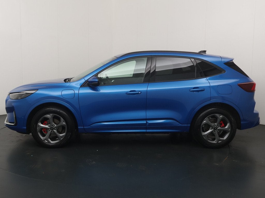 Ford Kuga 2.5 PHEV 243pk ST-Line X | Trekhaak I AGR stoelen, Auto's, Ford, 12 maanden, Adaptive Cruise Control, Gebruikt, Blauw