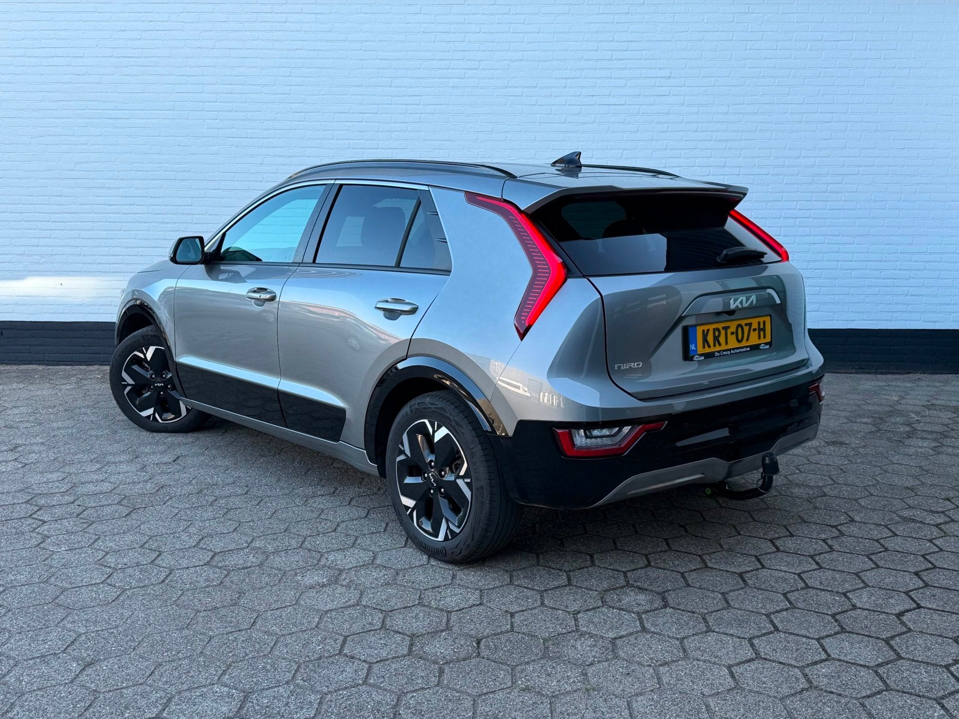 Kia Niro EV DynamicPlusLine 64.8 kWh ACC l CAMERA l TREKHAAK, Gebruikt, 1657 kg, Leder en Stof, Origineel Nederlands