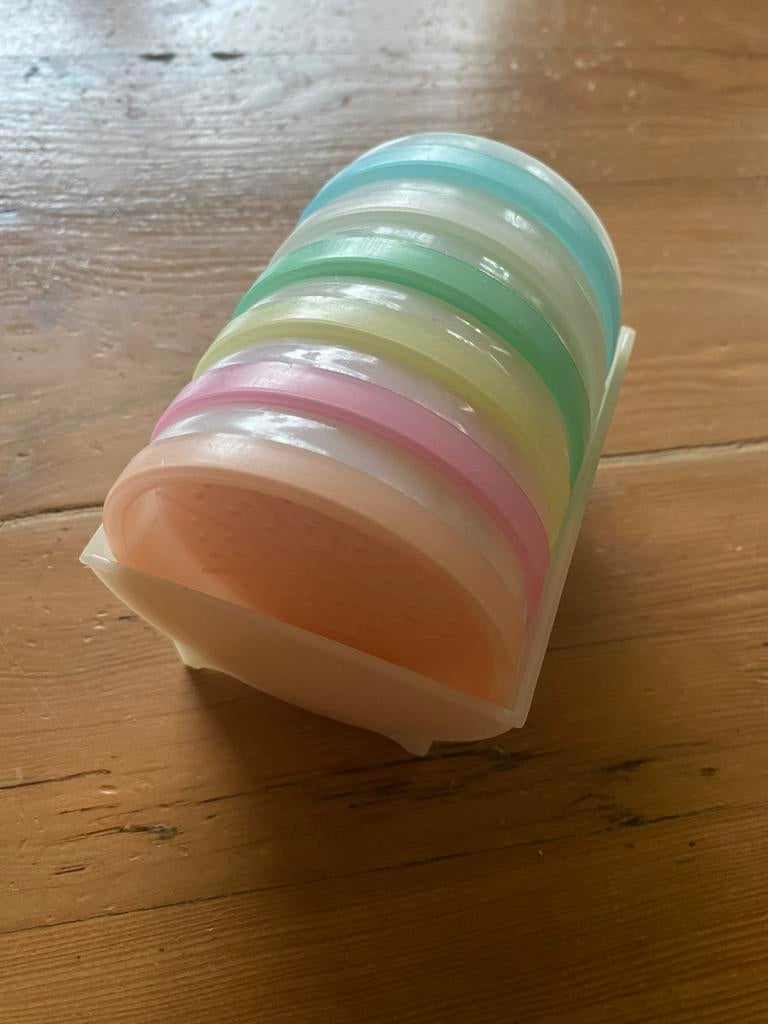 Vintage Tupperware onderzetters Wagon Wheel - pasteltinten, Ophalen of Verzenden, Zo goed als nieuw