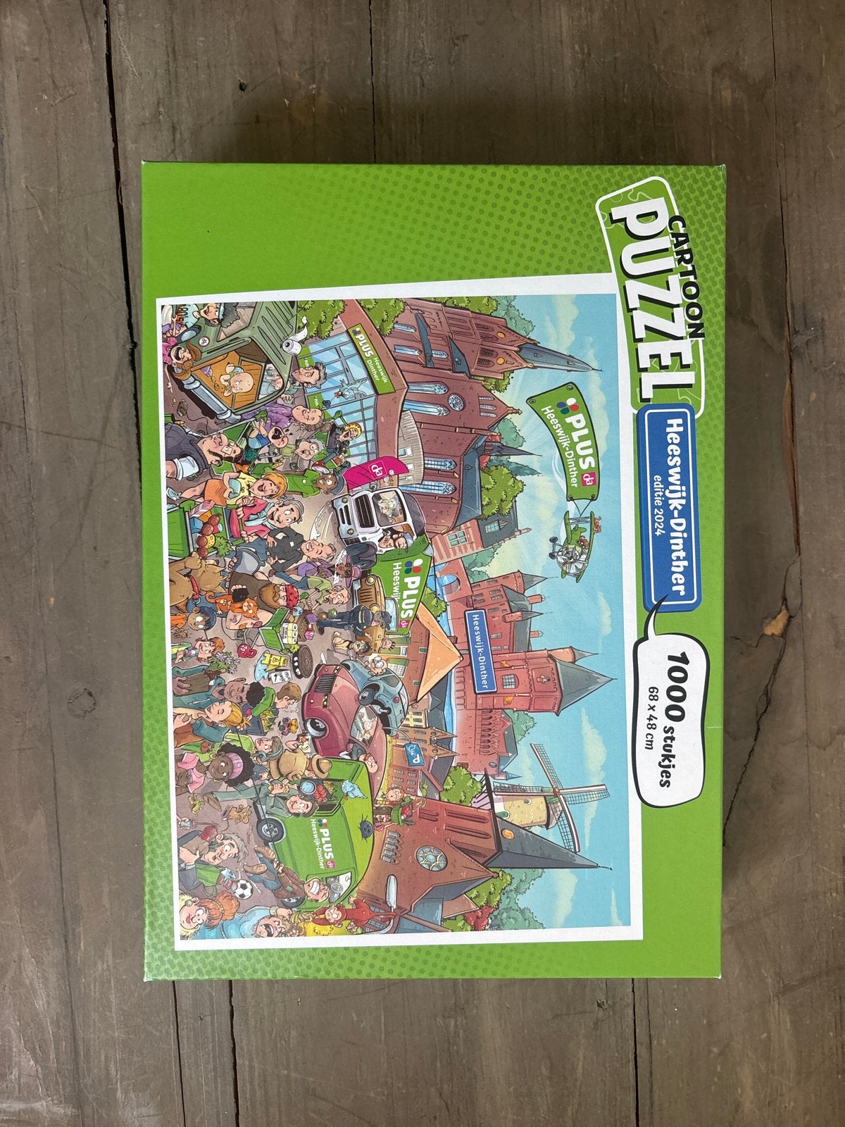 Cartoon Puzzel Heeswijk-Dinther editie 2024 - 1000 stukjes, Ophalen of Verzenden, 500 t/m 1500 stukjes, Nieuw, Legpuzzel