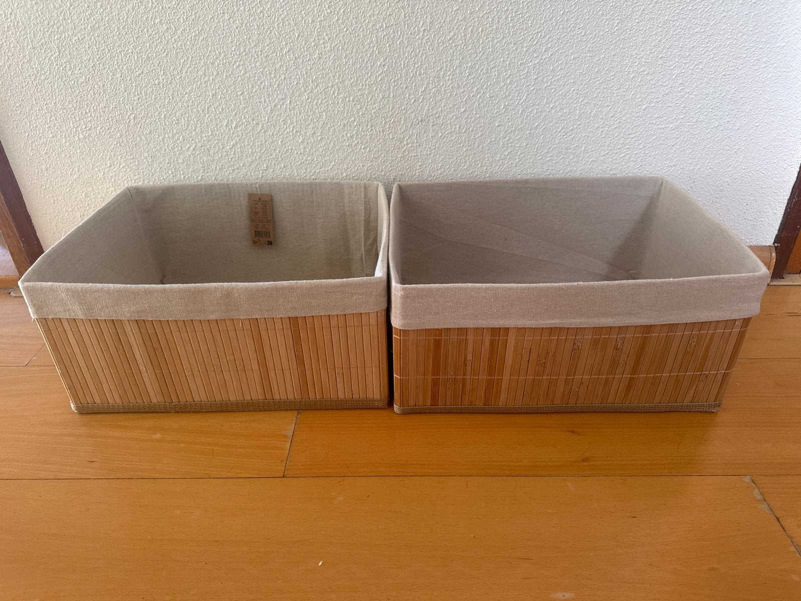 2x Bamboe opbergmanden met linnen voering - Zo goed als nieu, Huis en Inrichting, Woonaccessoires | Schalen en Manden, Ophalen
