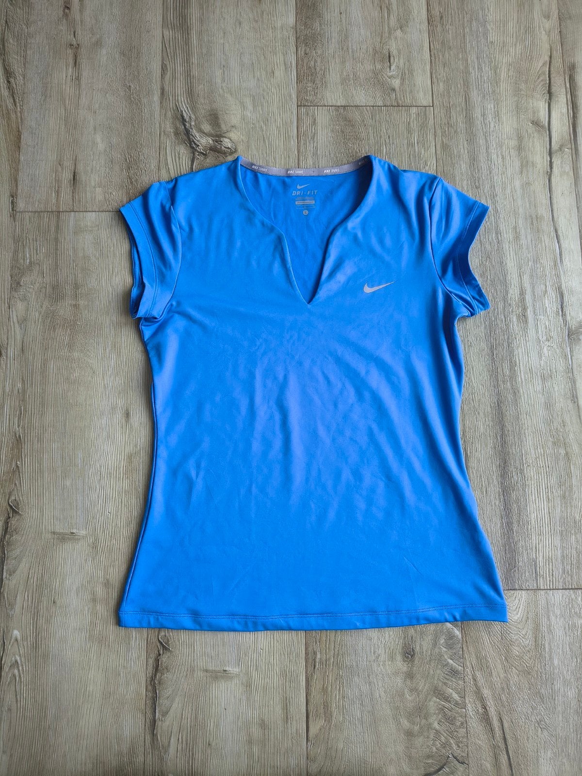 Prachtige lichtblauwe sporttop van Nike, tennis top Nike, L., Blauw, Onb, Maat 42/44 (L), Nike