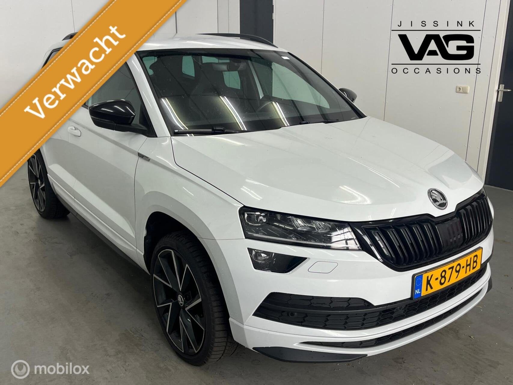 Skoda Karoq 1.5 TSI Sportline Automaat Trekhaak Canton Camer, Stof, 4 cilinders, 150 pk, Wit