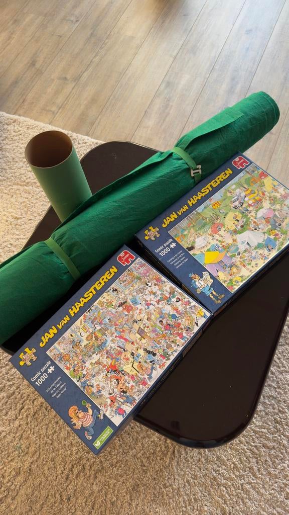 2 Jan van Haasteren puzzels 1000 stukjes + oprolmat, Hobby en Vrije tijd, Denksport en Puzzels, Ophalen, 500 t/m 1500 stukjes