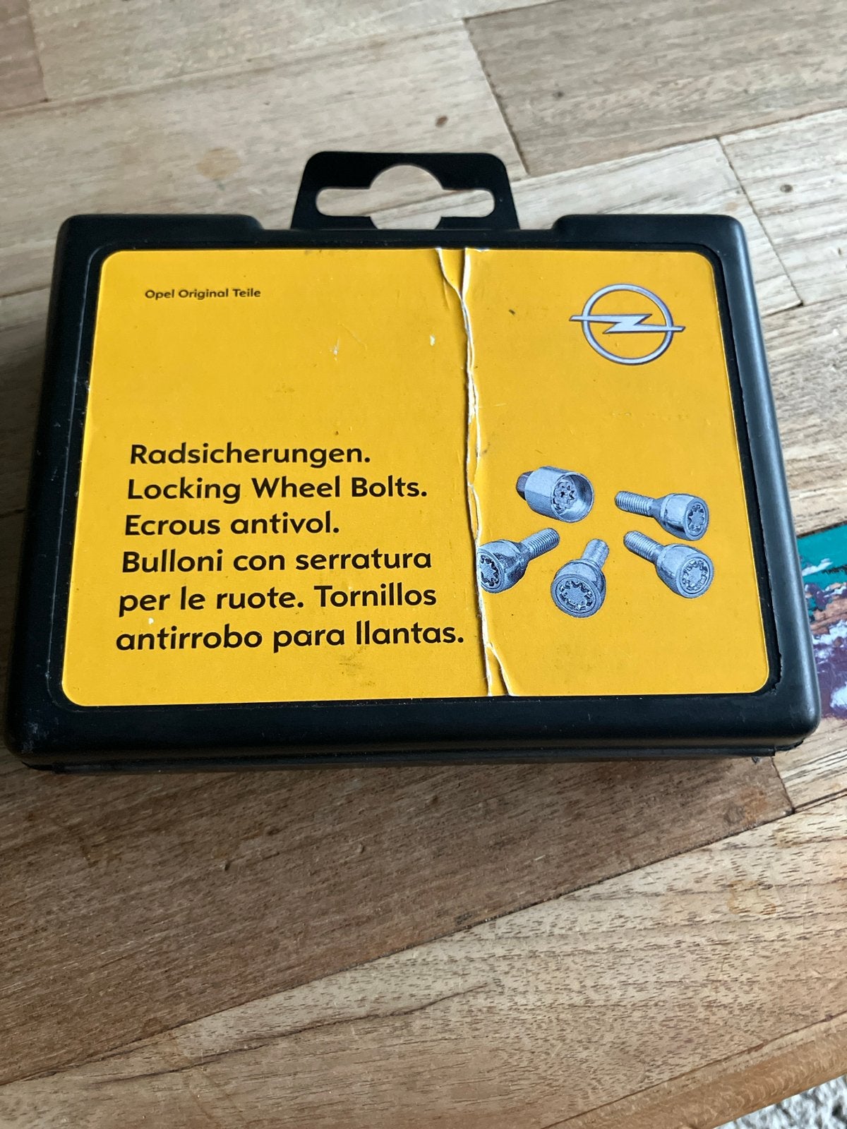 Opel originele wielbouten met slot - Radsicherungen, Ophalen of Verzenden, Gebruikt, Opel