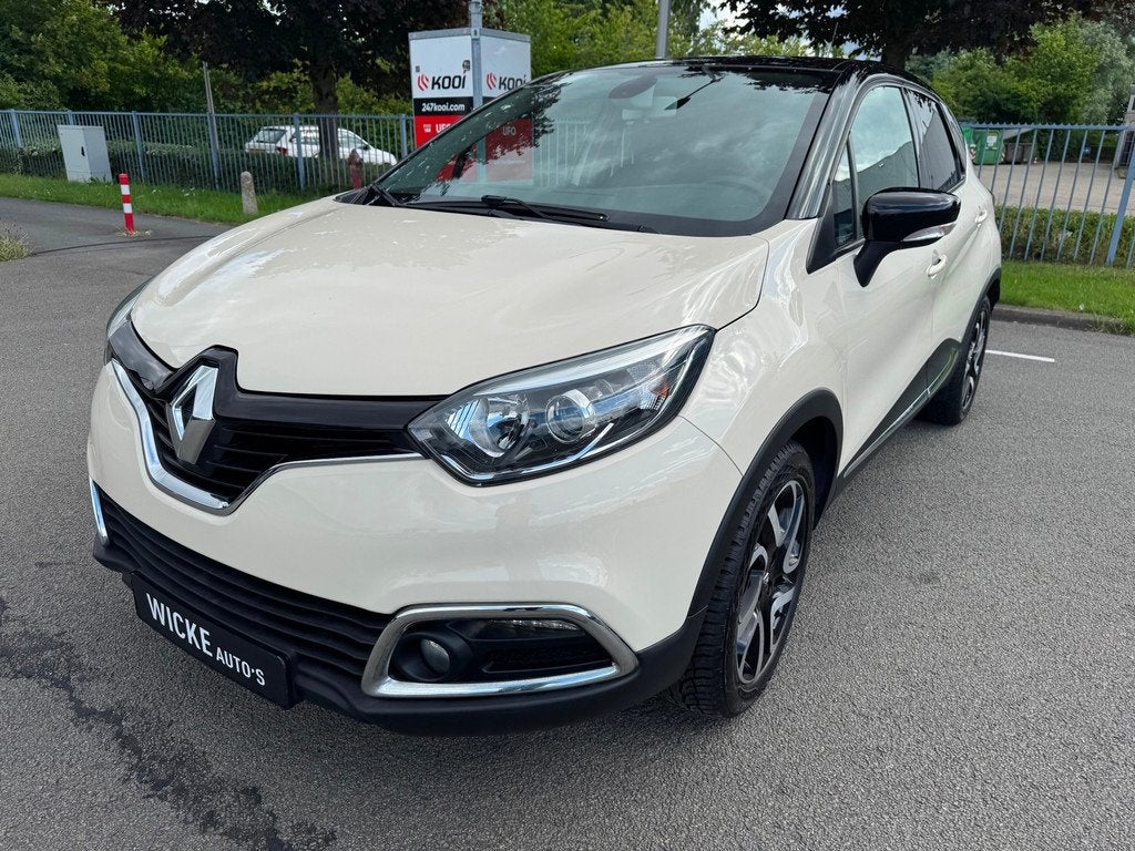 Renault Captur 1.2 TCe Dynamique Helly Hansen Automaat Navi, Auto's, Gebruikt, 4 cilinders, Wit, Origineel Nederlands
