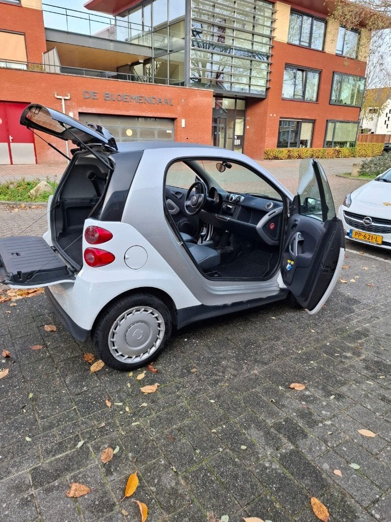 Smart ForTwo 1.0 45KW Coupe MHD AUT 2012 Wit, Auto's, Smart, Automaat, Achterwielaandrijving, 18 €/maand, Start-stop-systeem