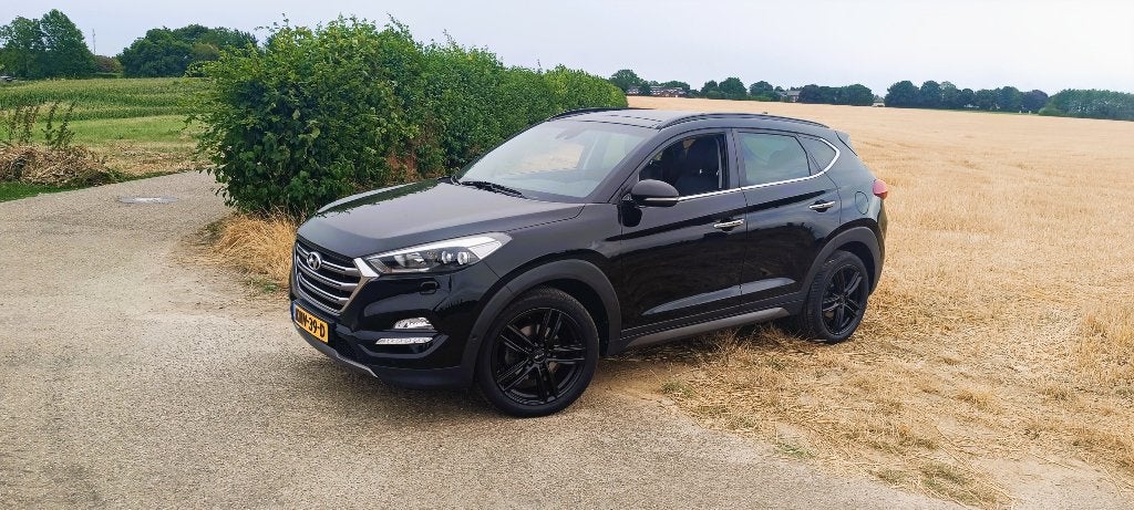 Hyundai Tucson Premium 4WD 177PK Automaat Navi Panoramadak, Auto's, Automaat, Zwart, Vierwielaandrijving, SUV of Terreinwagen