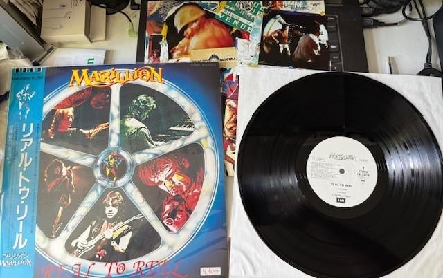 Marillion - Real to Reel japan promo lp + OBI + insert, Ophalen of Verzenden, Zo goed als nieuw, 12 inch, Progressive