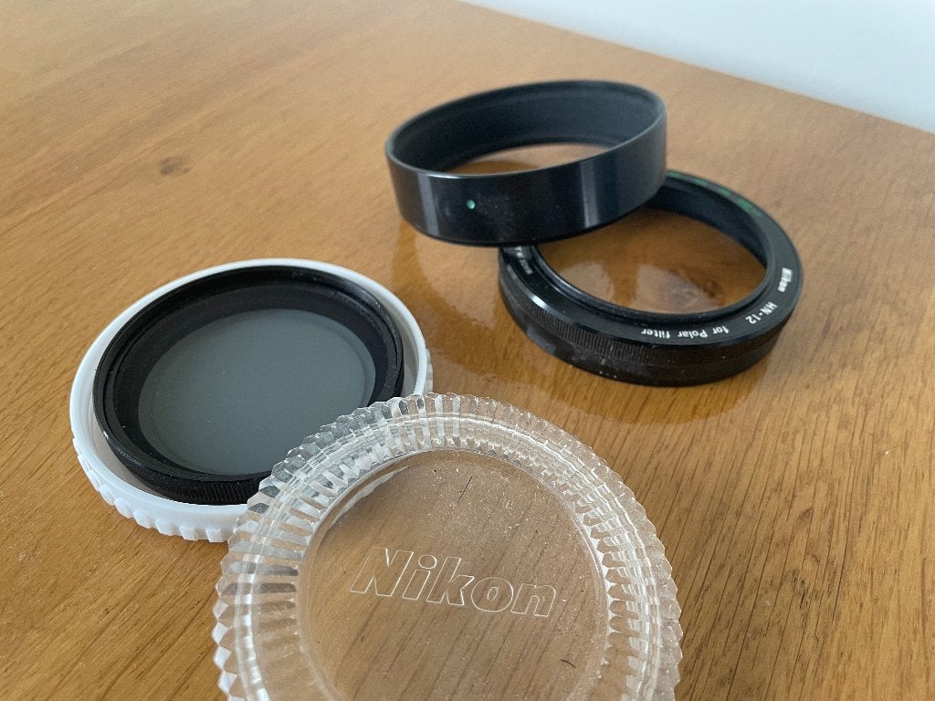Nikon 52mm polar filter + hn12 zonnekap, Polarisatiefilter, Gebruikt, Ophalen of Verzenden, Nikon