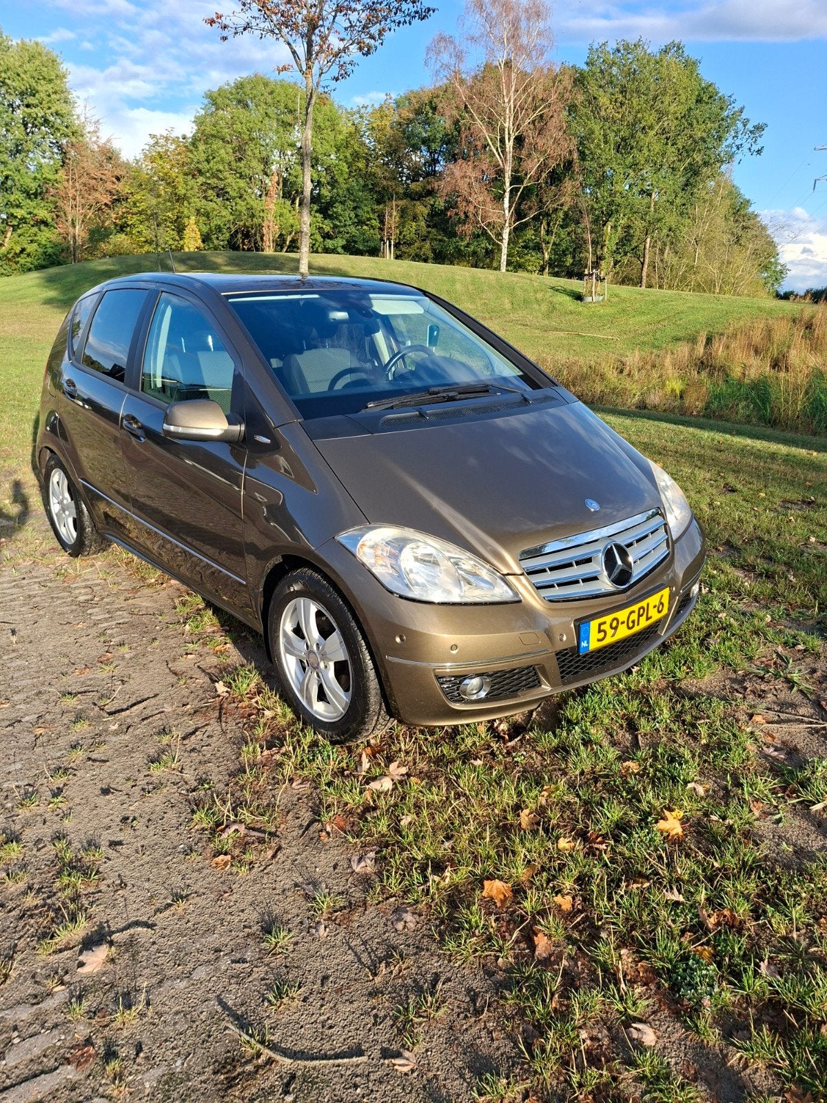 Mercedes-Benz A-Klasse 1.7 A180 5DRS  Automaat Advangarde, Auto's, Zwart, 4 cilinders, Bruin, Leder en Stof