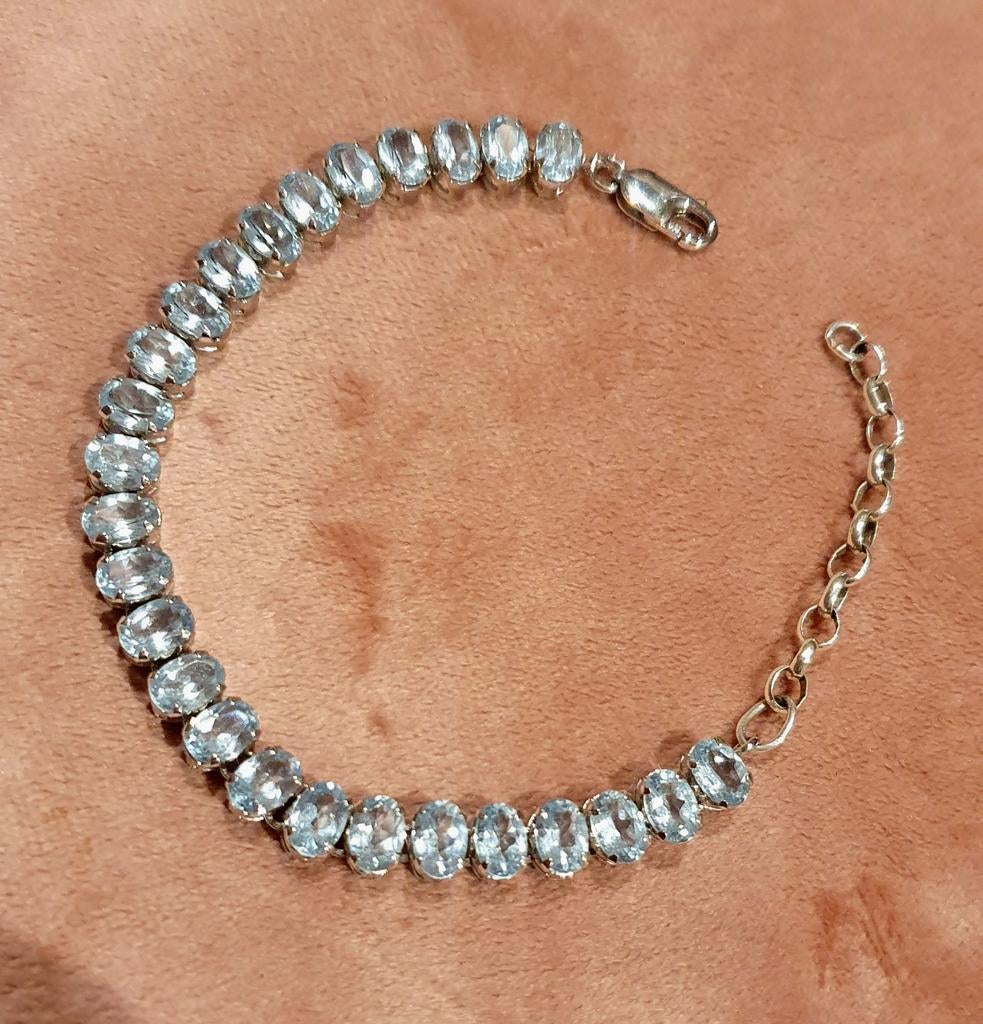 Zilveren armband met blauwe topaas, Blauw, Ophalen of Verzenden, Zo goed als nieuw, Met edelsteen