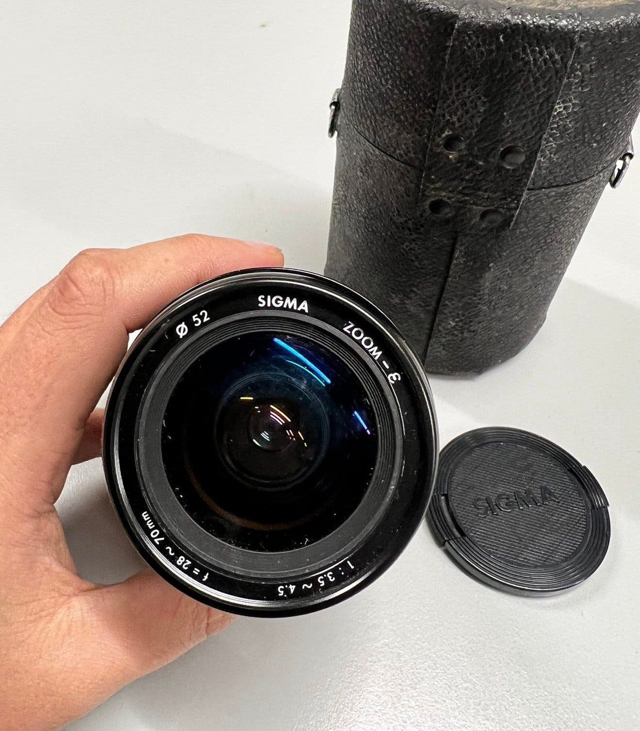 Sigma Zoom-E 1:3.5-4.5 f= 28-70 Multi-Coated + Canon adapt., P, Sigma, P, P