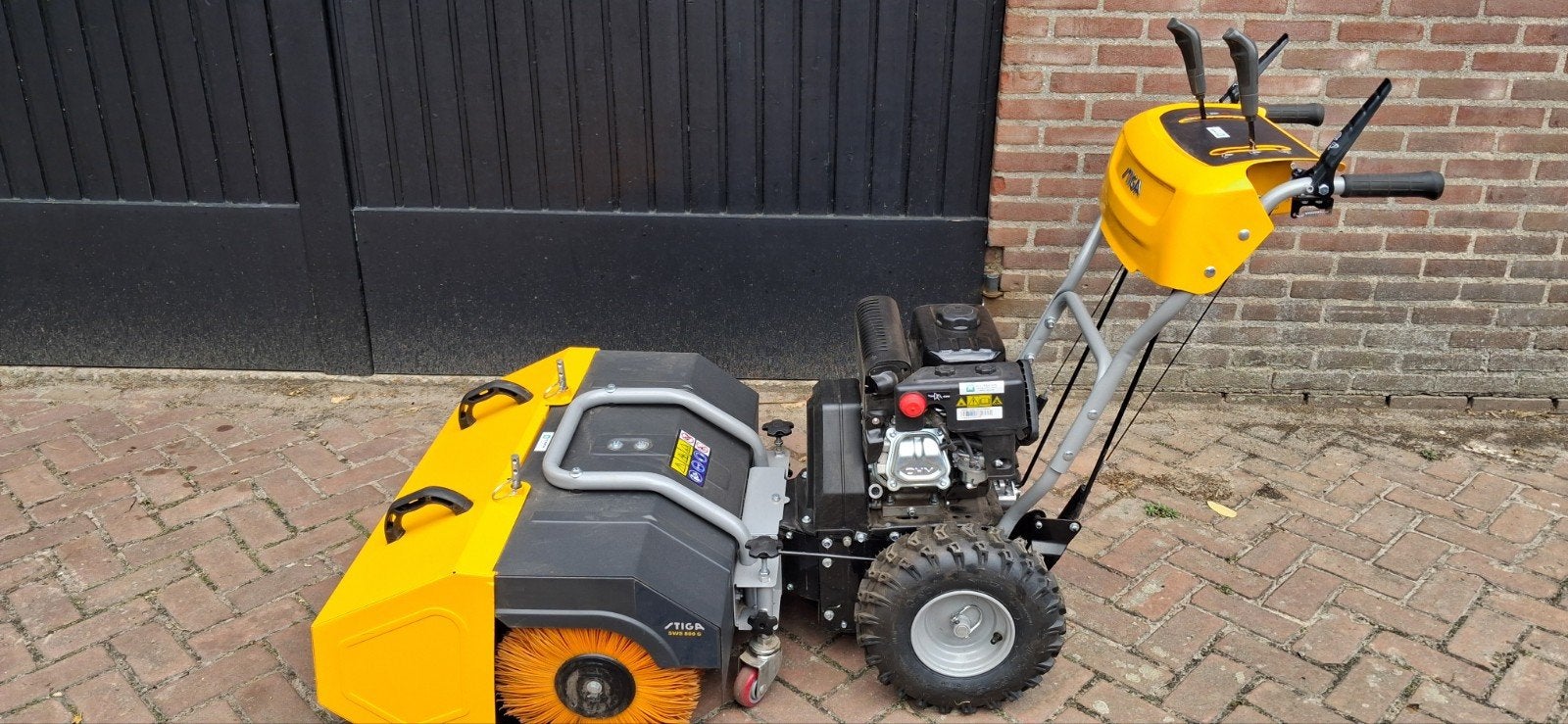 veegmachine stiga, Ophalen