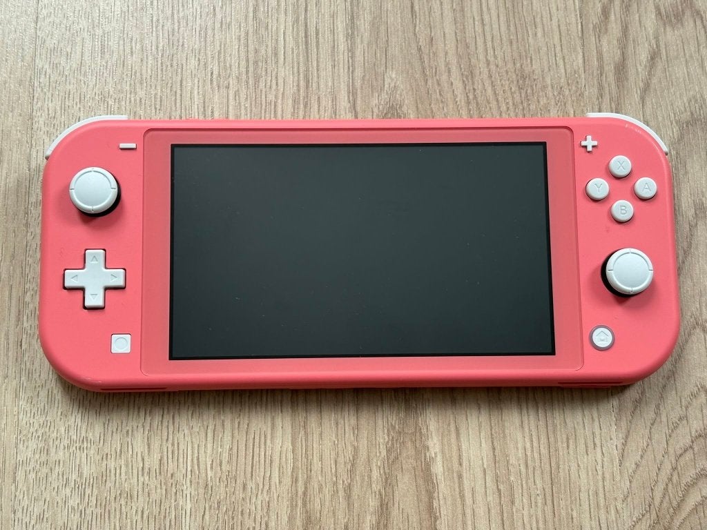 Nintendo Switch Lite, Spelcomputers en Games, Spelcomputers | Nintendo Switch Lite, Ophalen of Verzenden, Roze of Coral, Zo goed als nieuw