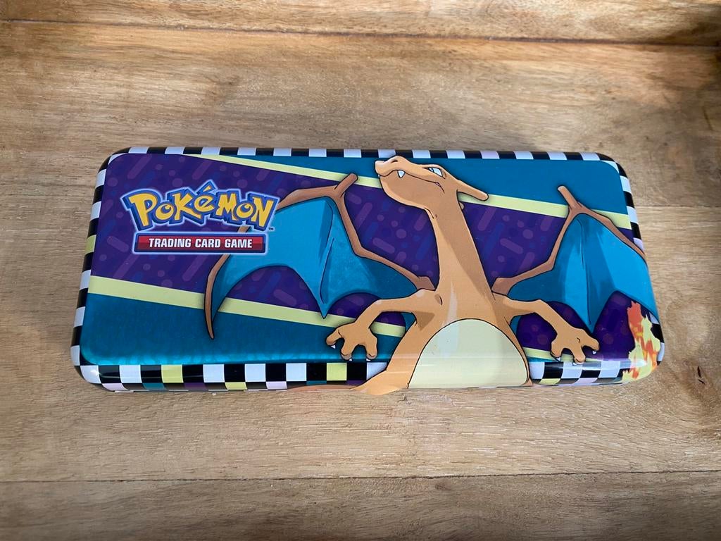 Charizard pennen/potlood blik, Ophalen of Verzenden, Zo goed als nieuw, Overige typen