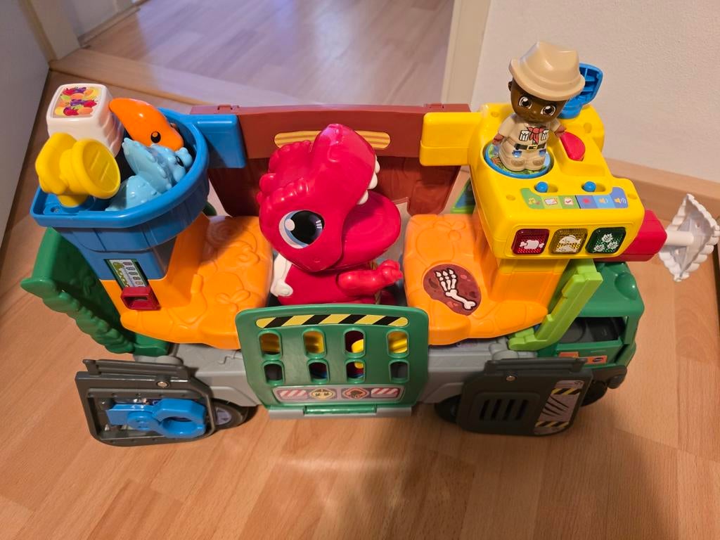 Vtech vrolijke vriendjes Dinowagen, Kinderen en Baby's, Speelgoed | Vtech, Ophalen, Zo goed als nieuw, 6 maanden tot 2 jaar