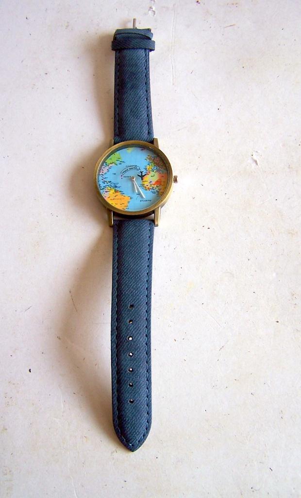 Prachtig wereldkaart horloge met vliegtuig secondenwijzer., Ophalen of Verzenden, Zo goed als nieuw
