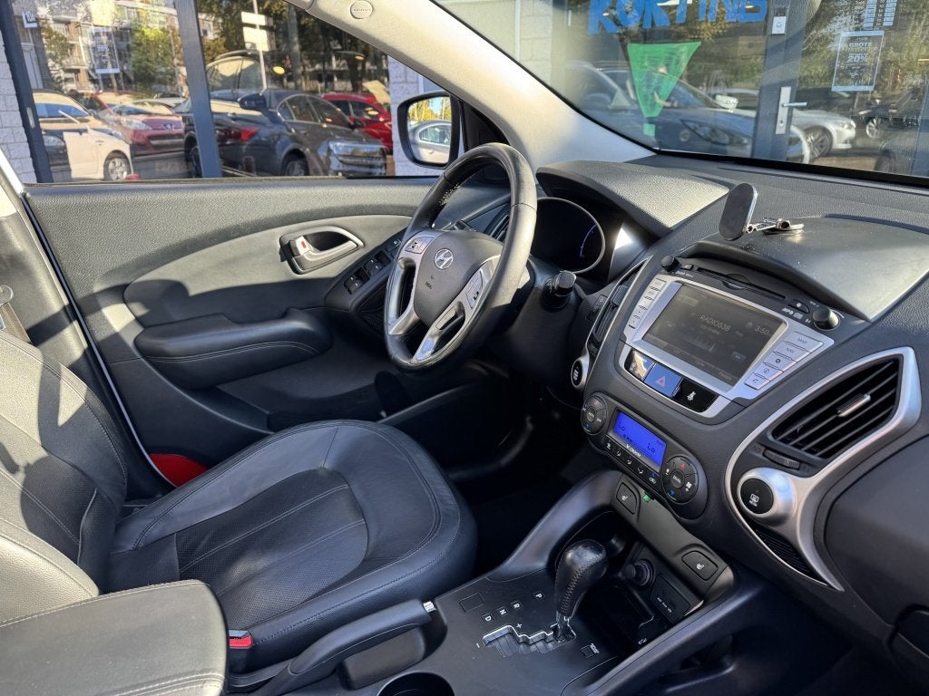 Hyundai ix35 2.0i Panoramadak Leer Automaat Camera, Auto's, Verwarmde buitenspiegels, Gebruikt, 4 cilinders, 1600 kg