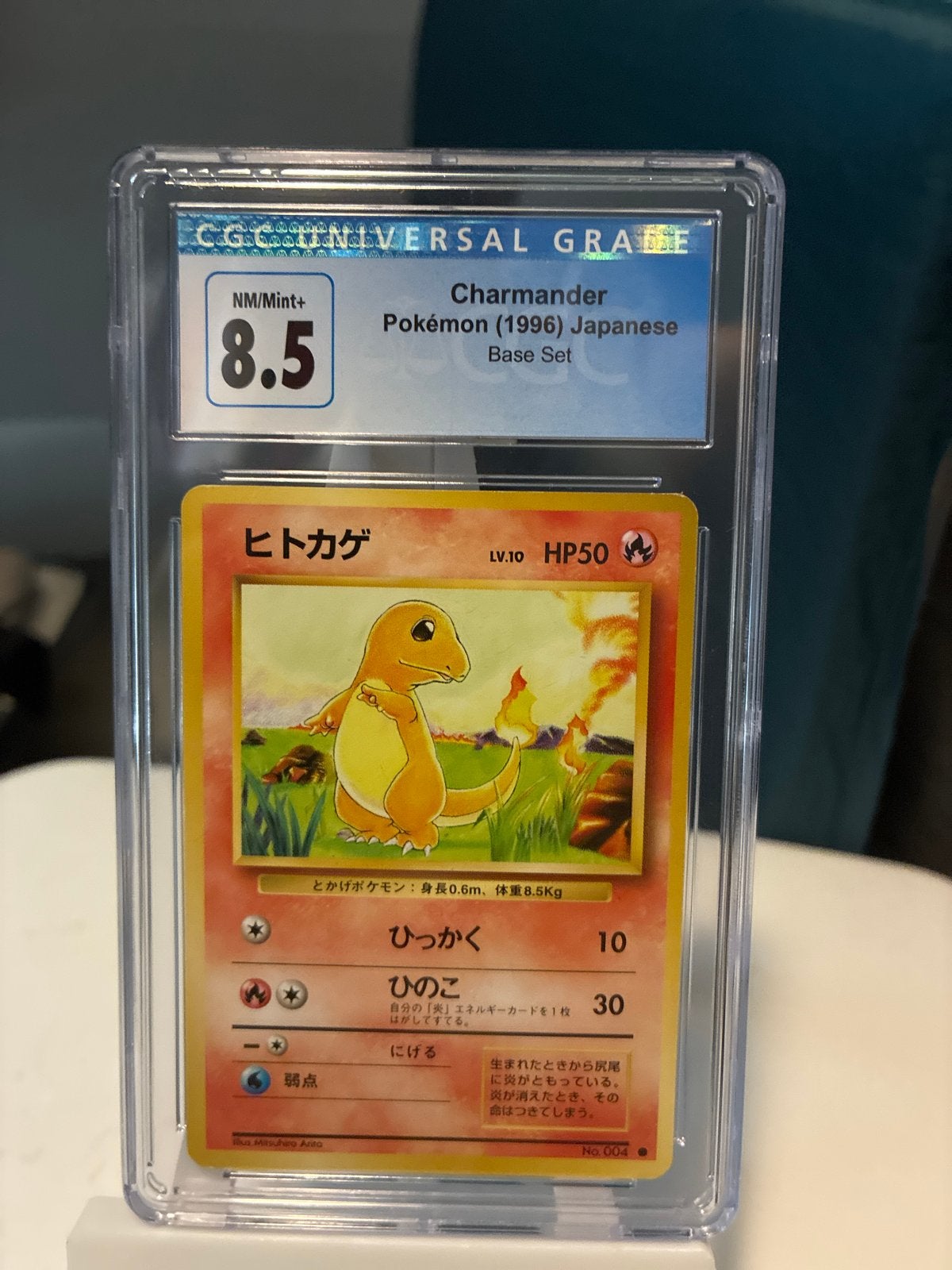 Charmander Pokémon (1996) Japanese Base Set CGC 8.5, Ophalen, Zo goed als nieuw, Losse kaart