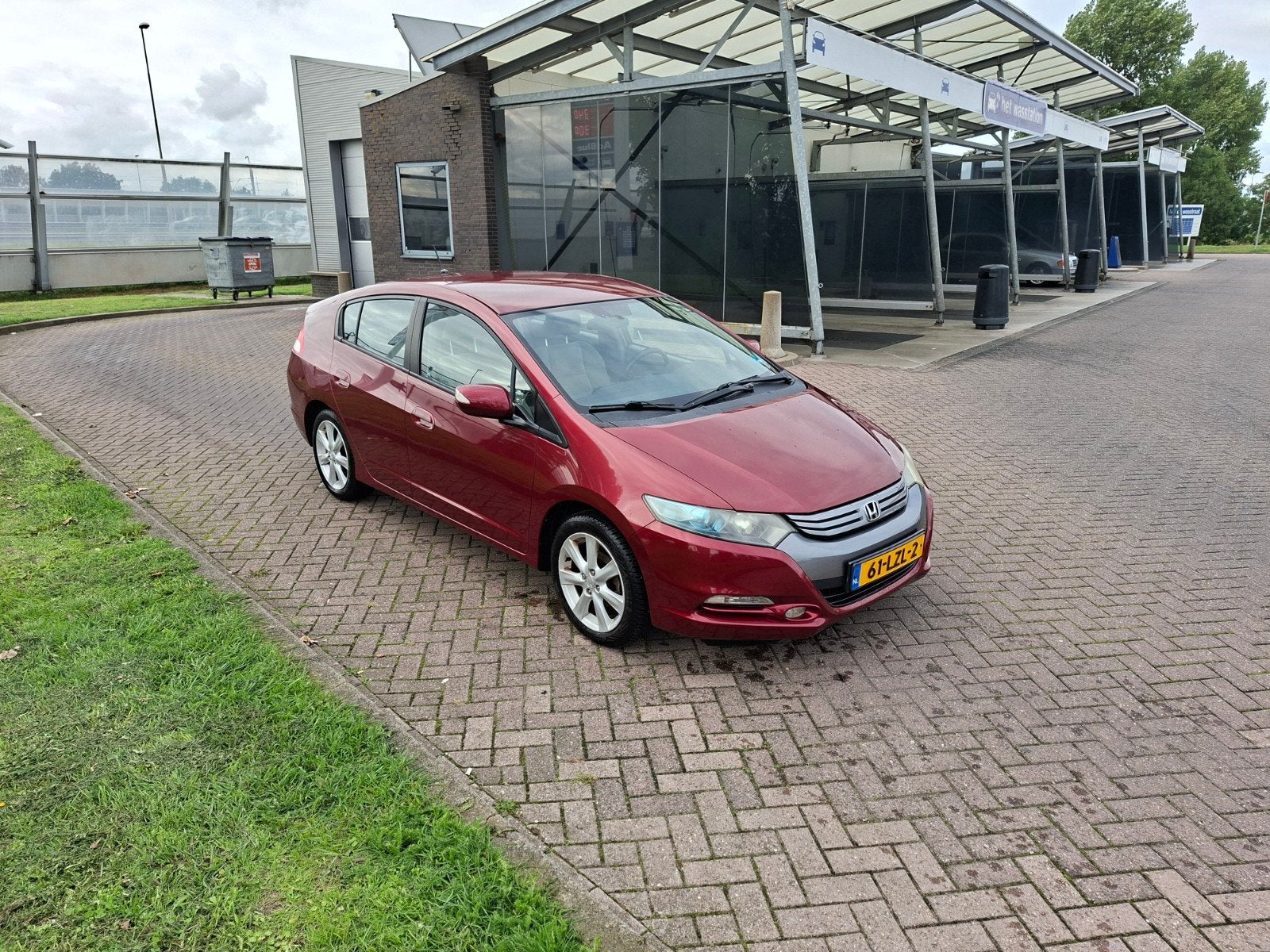 Honda Insight 1.3 Hybrid AUT 2010 Rood, Auto's, 4 cilinders, 22 km/l, Te koop, 88 pk
