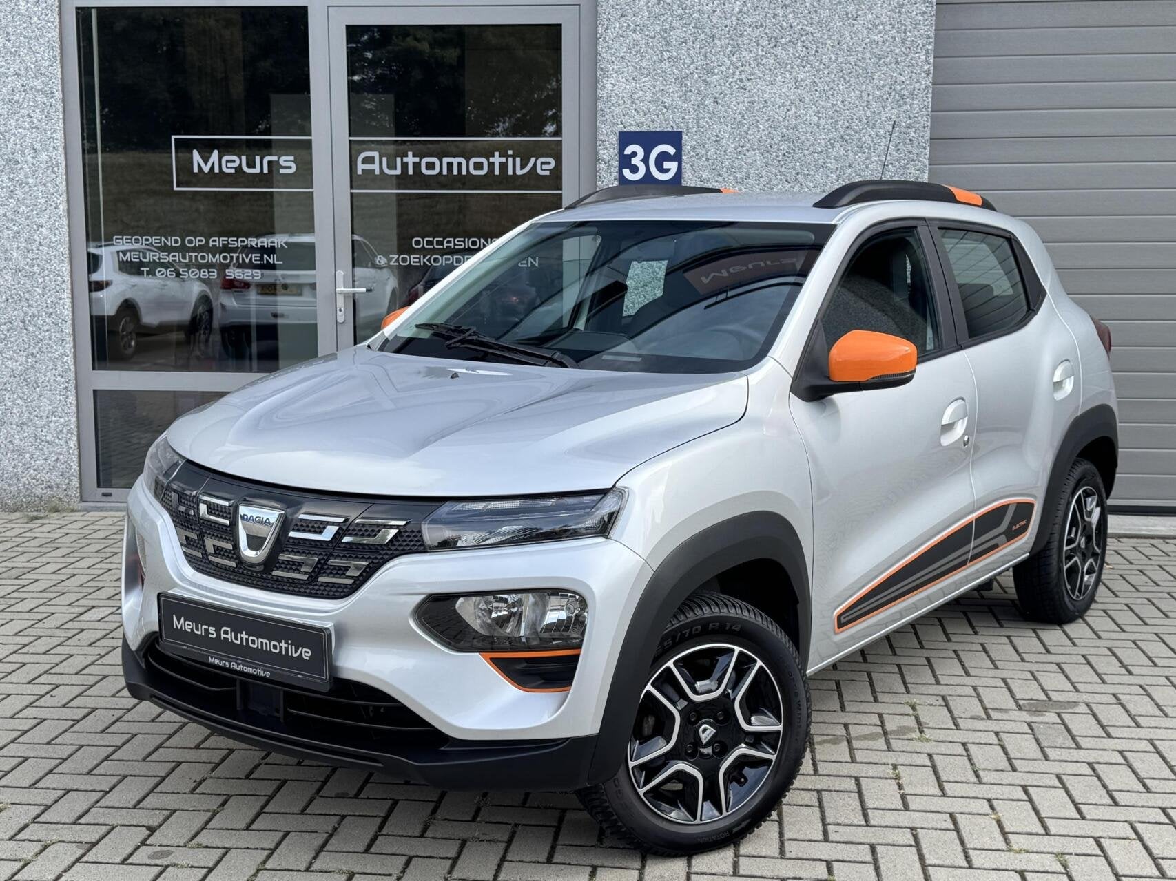 Dacia Spring Comfort Plus (Orange Pack) SOH 93% 27 kWh/Navi/, Gebruikt, Zwart, 230 km, Parkeersensor