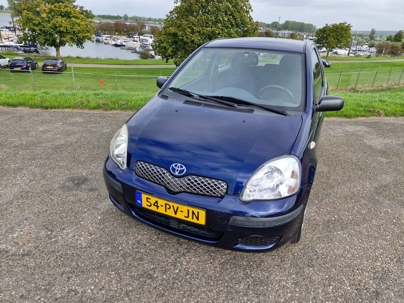 Toyota Yaris 1.0 16V Vvti 3DR 2005 Blauw Apk tot 18-09-2027, Stof, 4 cilinders, 855 kg, Origineel Nederlands