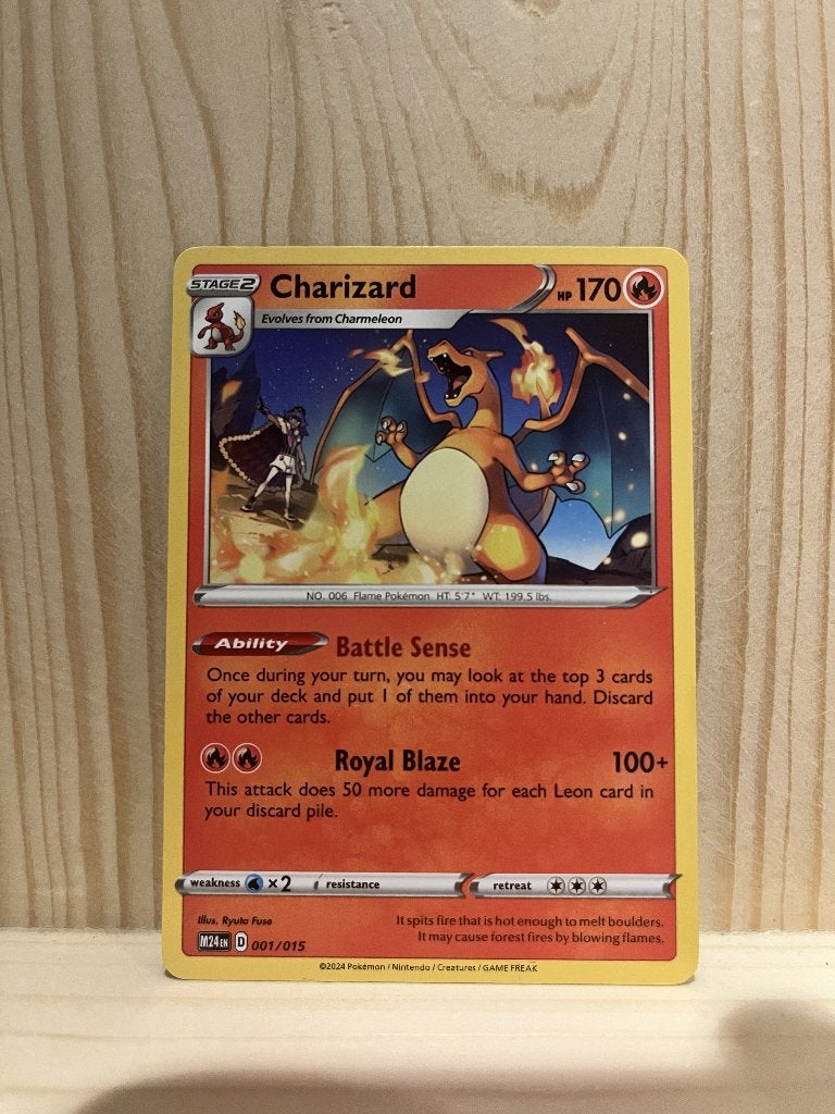 Charizard (M24 001) Pokemon kaart, Ophalen of Verzenden, Zo goed als nieuw, Losse kaart
