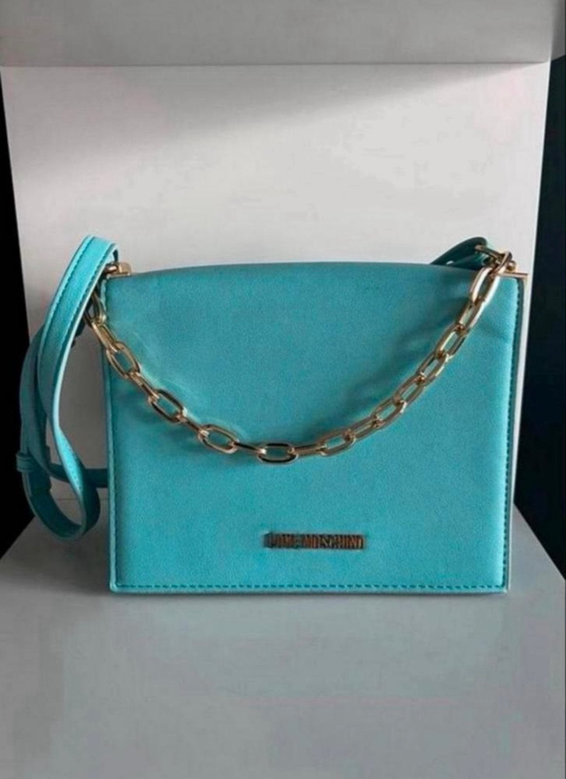 Love Moschino tas met defect - Turquoise schoudertas, Ophalen of Verzenden, Gebruikt, Overige kleuren, Schoudertasje