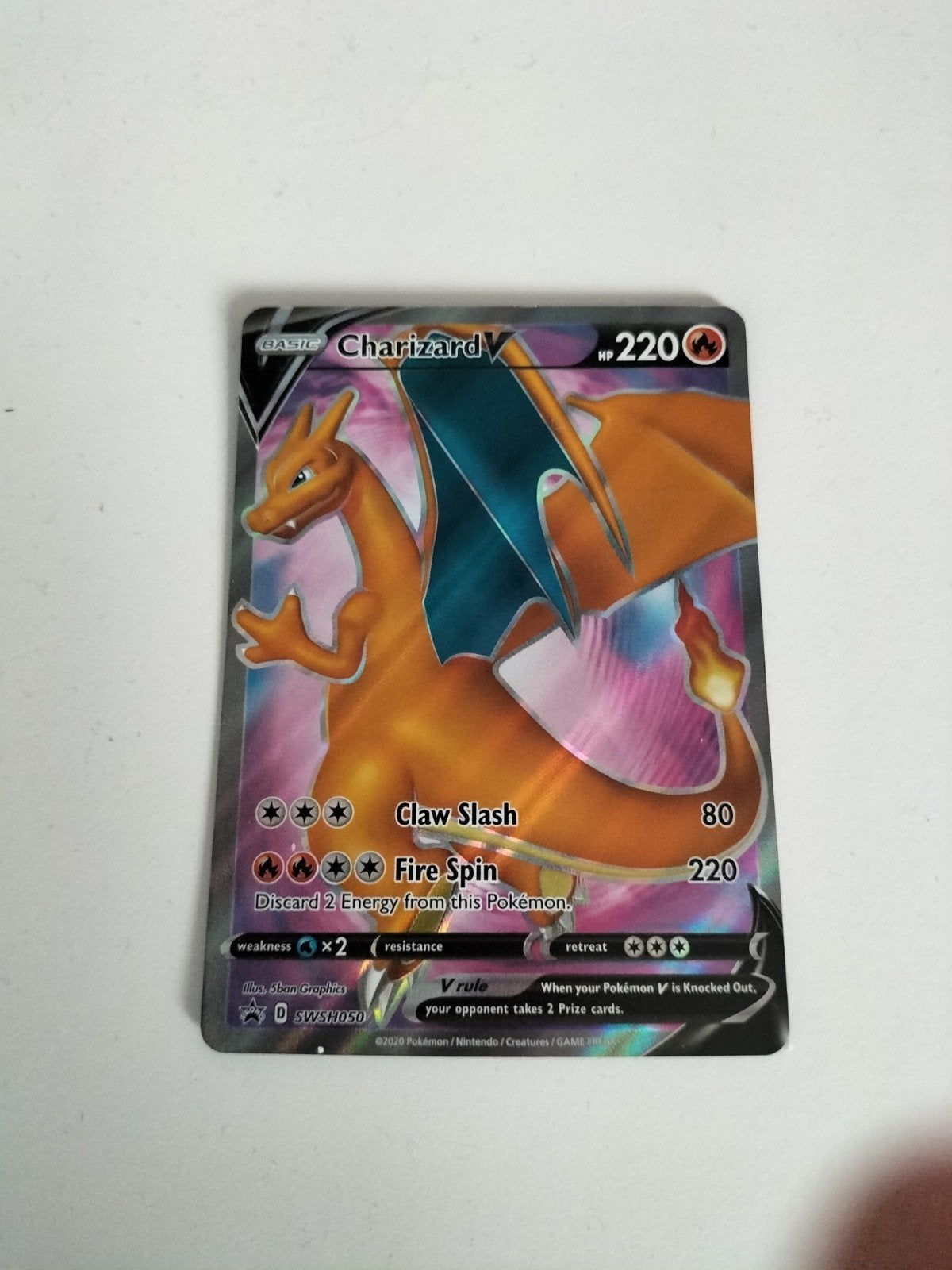 Charizard V SWSH050 Pokémon Kaart, Ophalen of Verzenden, Zo goed als nieuw, Losse kaart