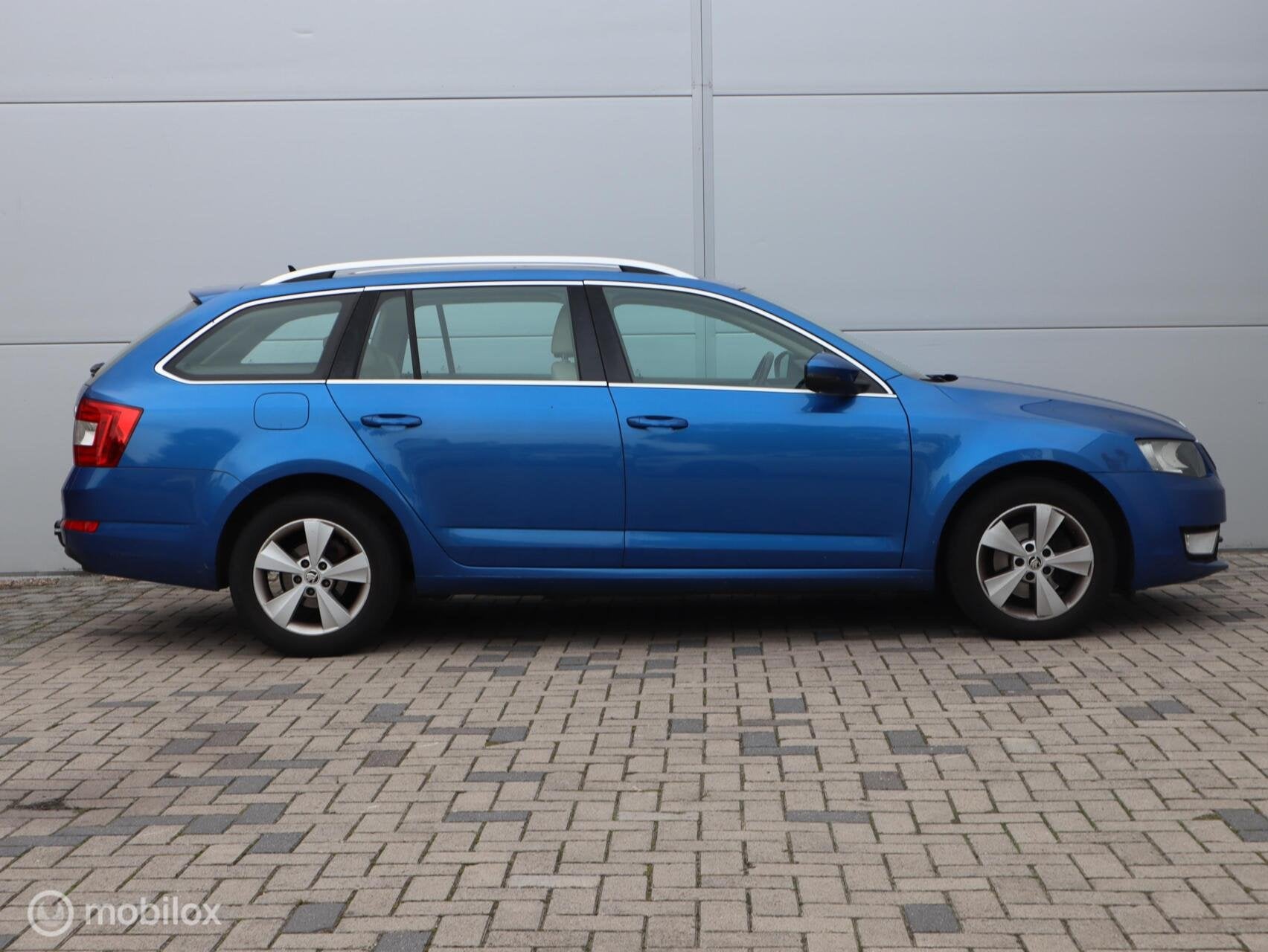Skoda Octavia Combi 1.4 TSI Automaat Trekhaak Pano Clima Nav, Auto's, Euro 5, Stof, Gebruikt, Beige