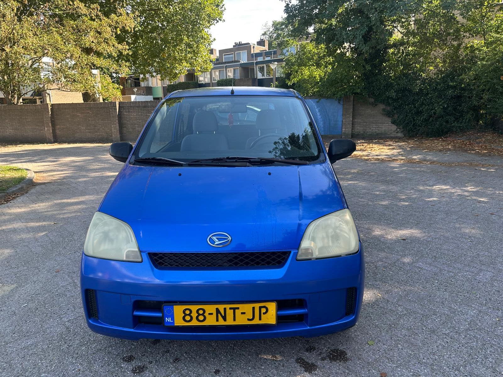 Daihatsu Cuore 1.0 3D AUT 2004 Blauw, 600 kg, 18 €/maand, Cuore, Origineel Nederlands