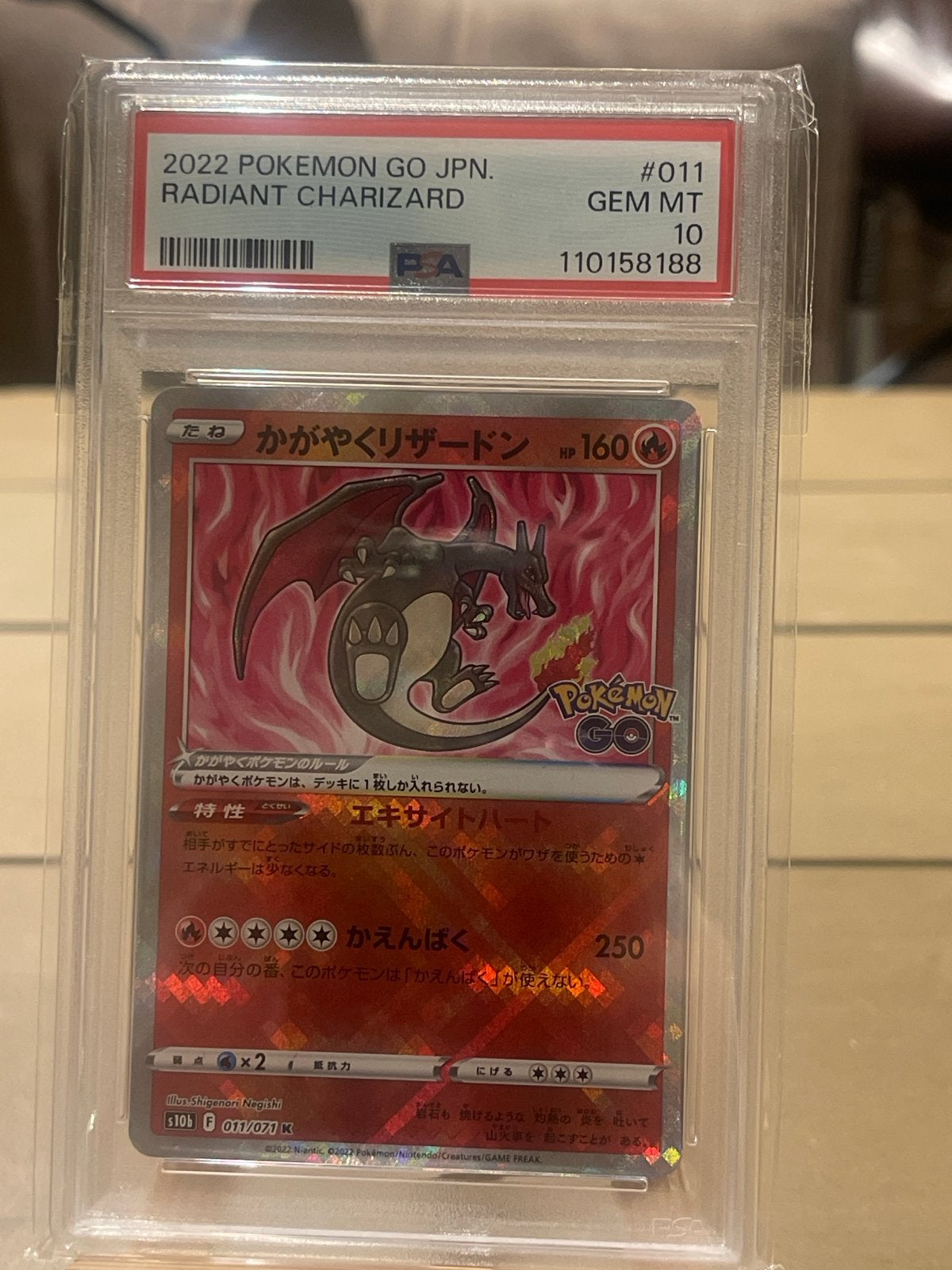 PSA 10 Radiant Charizard 2022 Pokemon Go JPN #011, Ophalen of Verzenden, Nieuw, Losse kaart, Foil