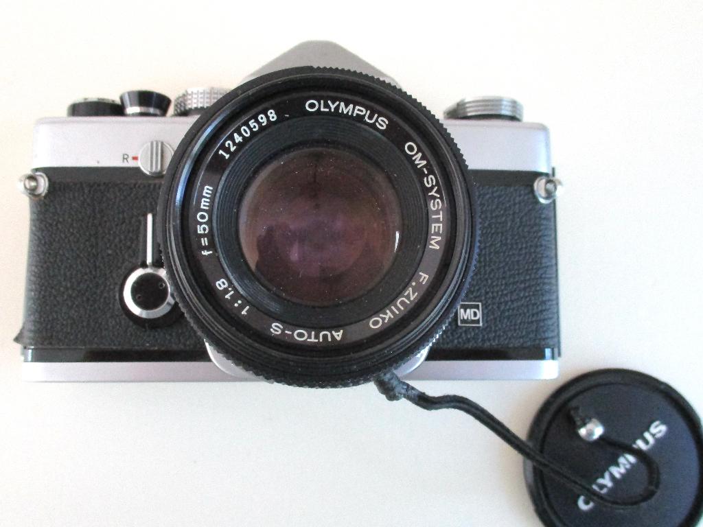 Olympus OM-1 incl. flitser, tas en handleiding, Ophalen of Verzenden, Gebruikt, Spiegelreflex, Olympus