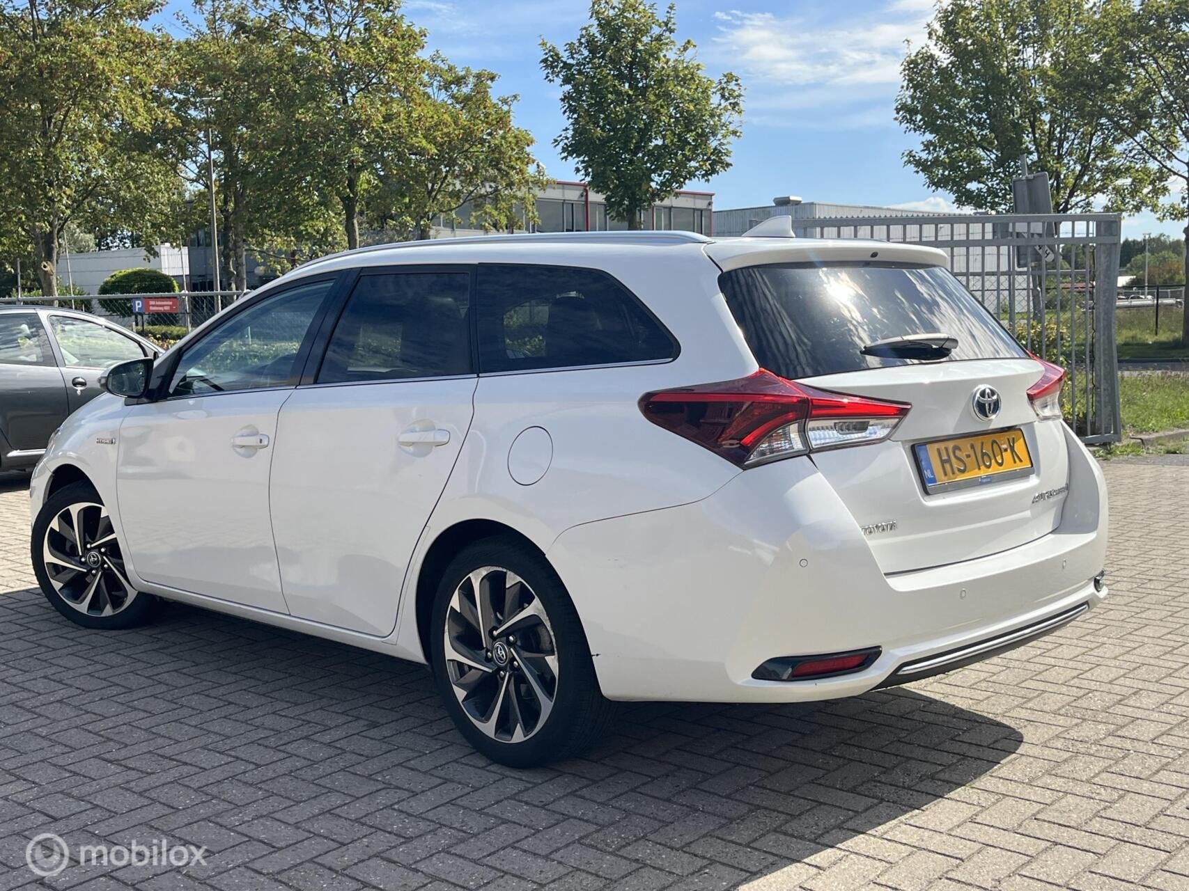 Toyota Auris 1.8 Hybrid Lease Pro Leder,Panoramadak,Camera,N, Dealer onderhouden, Gebruikt, Euro 6, Wit