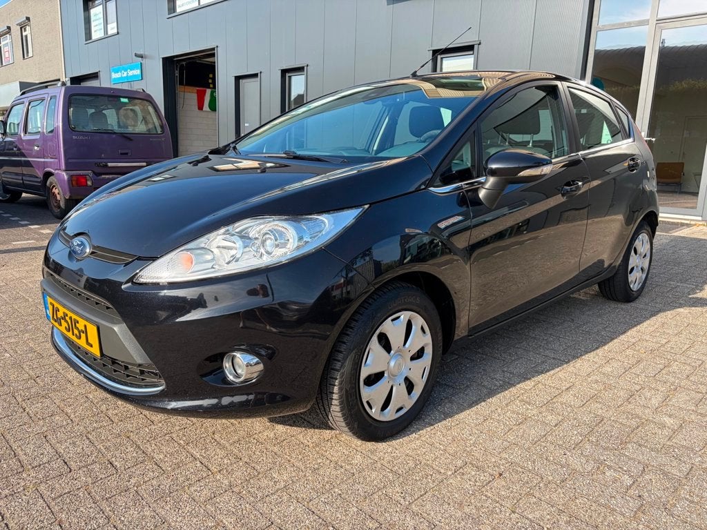 Ford Fiesta 1.4 Ghia, Stoelverw. Clima, Bluetooth, Auto's, Voorwielaandrijving, Euro 5, Zwart, Bedrijf