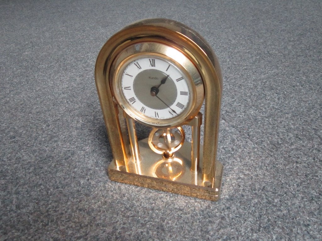 KUNDO TAFELKLOK, Ophalen