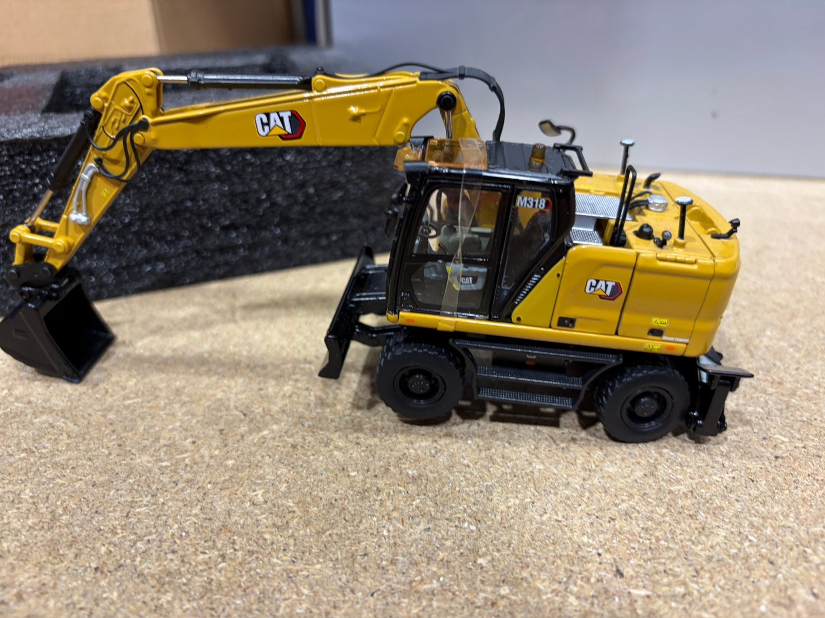 CAT M318 WIELLADER GRONDVERZET, Ophalen of Verzenden, Nieuw, Hijskraan, Tractor of Landbouw, Overige merken