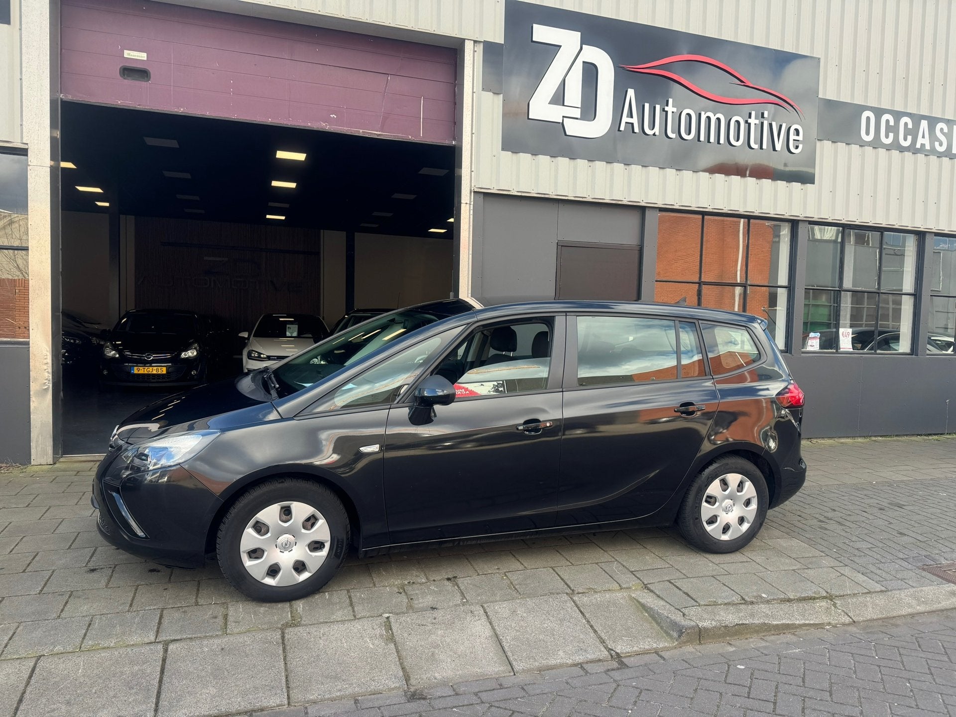 Opel Zafira Tourer 1.4 Business Edition, Auto's, Euro 5, 4 cilinders, Zwart, Origineel Nederlands