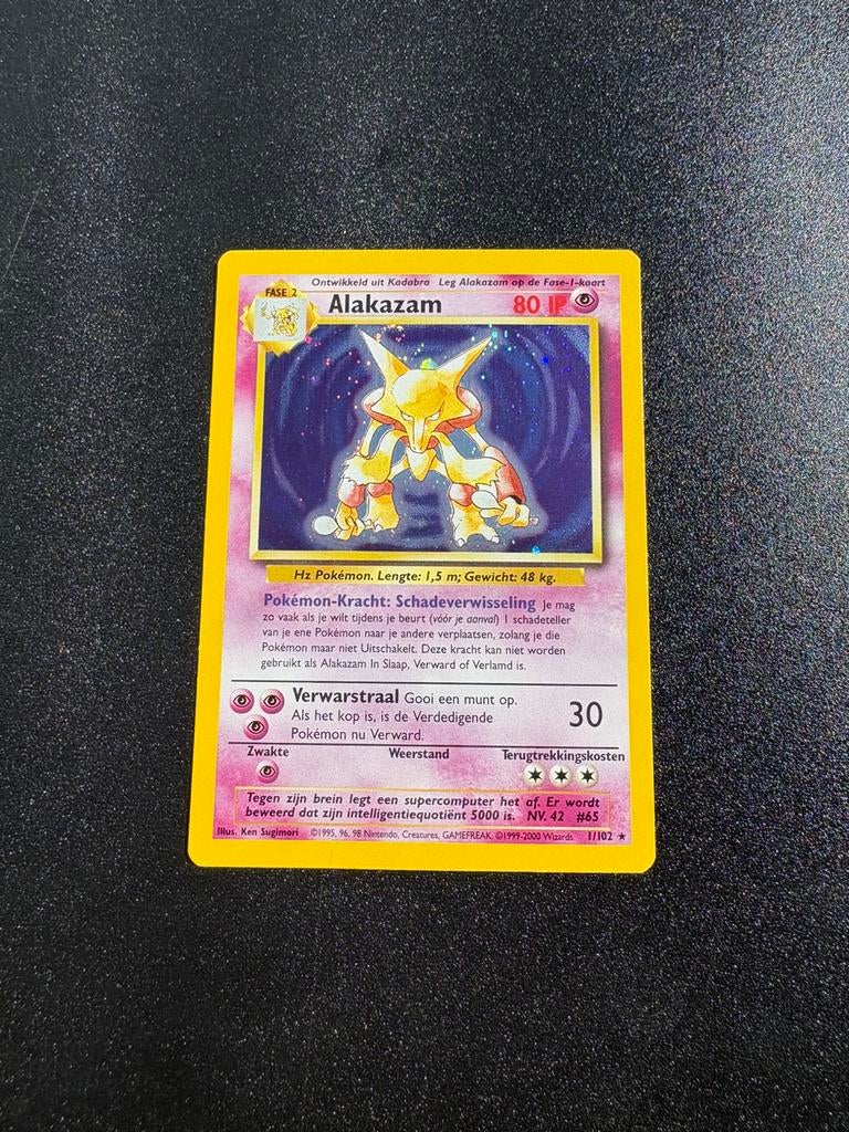 Alakazam base set 1/102 NL Pokemon, Ophalen of Verzenden, Zo goed als nieuw