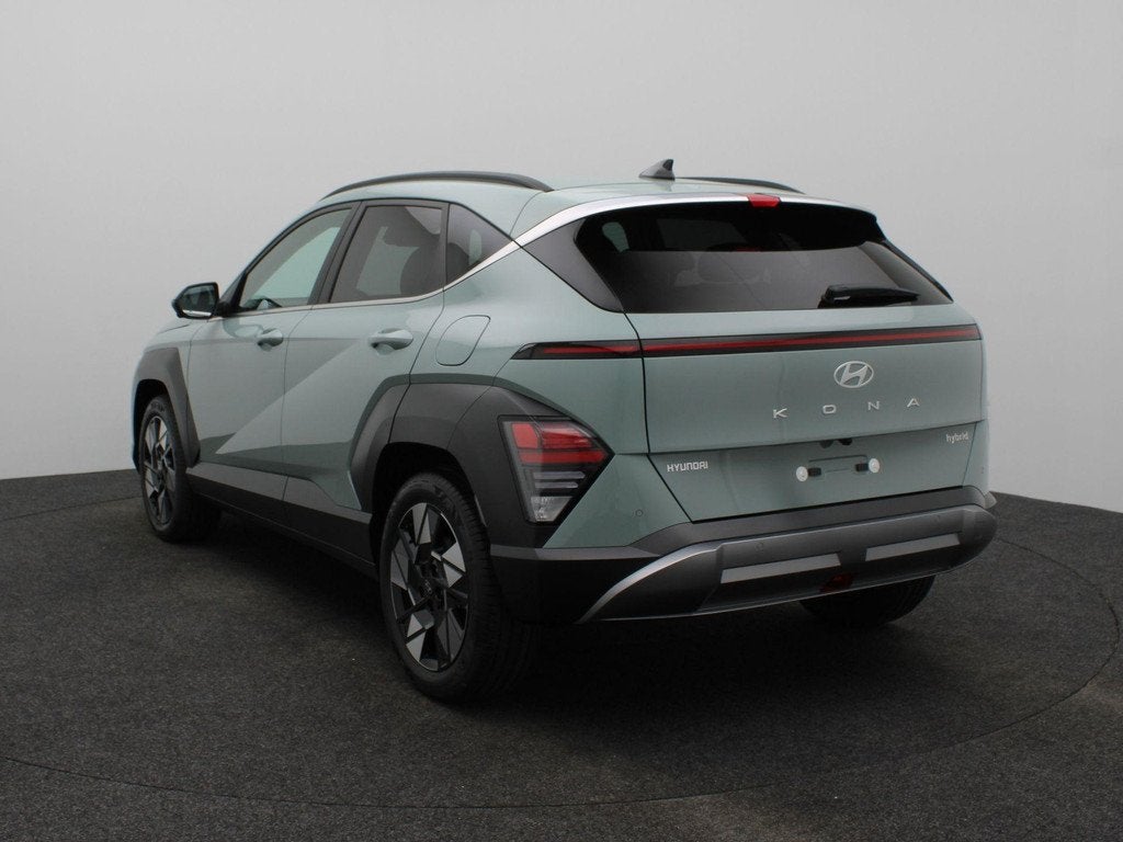 Hyundai Kona 1.6 GDI HEV Premium | Lederen bekleding | Stoel, Auto's, 137 pk, Euro 6, Met garantie (alle), Leder