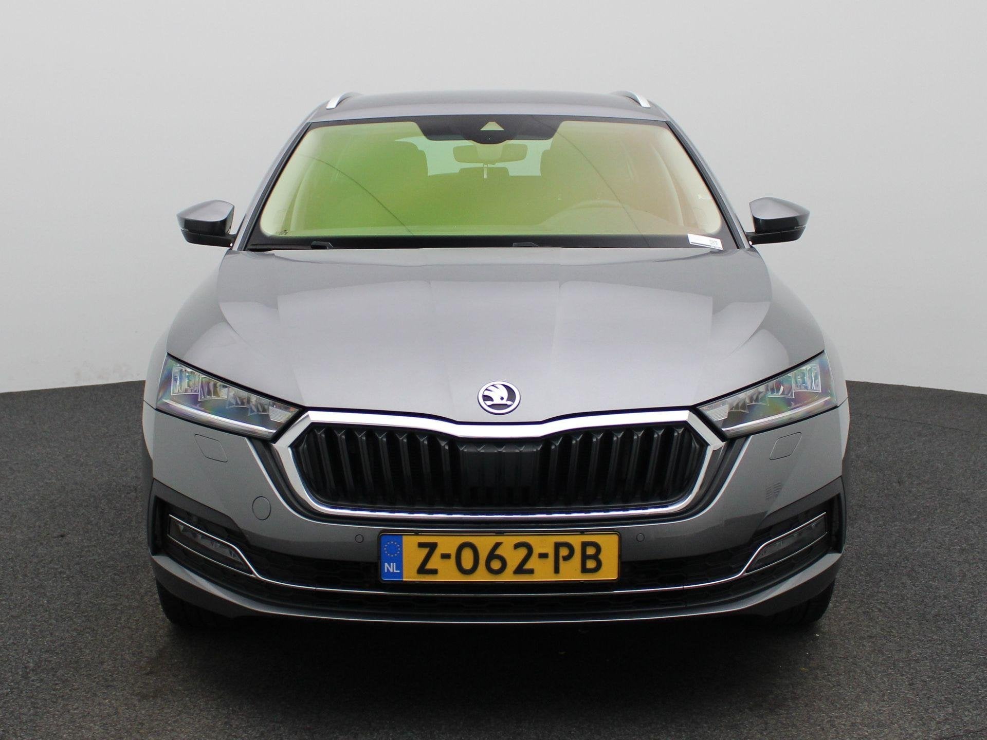 Skoda Octavia Combi 1.4 TSI iV PHEV Business Edition | Autom, Auto's, Stof, 4 cilinders, 1553 kg, Verwarmde buitenspiegels