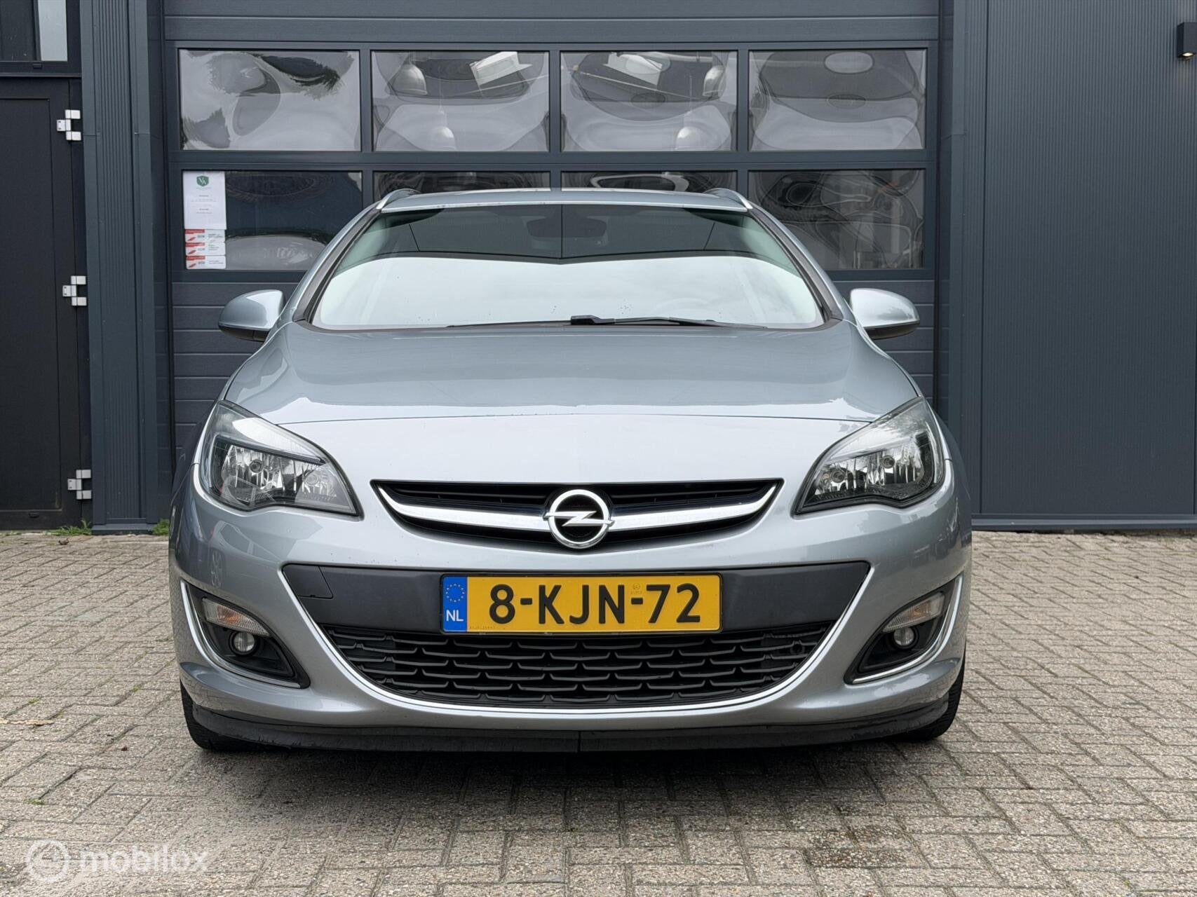 Opel Astra Sports Tourer 1.4 Turbo | Airco | Cruise | Navi, Voorwielaandrijving, Euro 5, Gebruikt, 4 cilinders