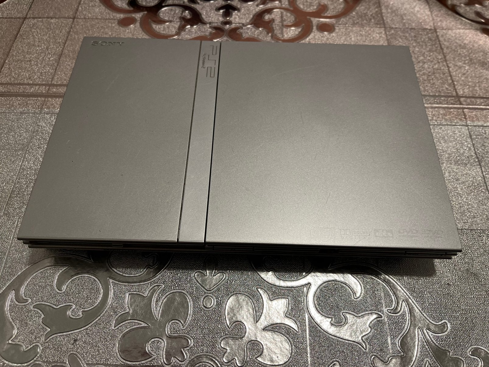 PlayStation 2 Slim Zilver + Controller, Kabels & 4 Games, Met games, Ophalen of Verzenden, Zo goed als nieuw, Met 1 controller