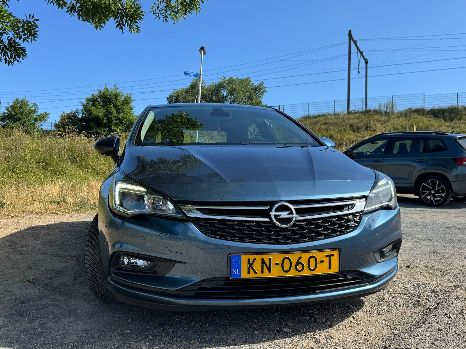 Opel Astra 1.0 Turbo 77KW Apple CarPlay + Navi + Cruise, Blauw, 610 kg, 23 km/l, Origineel Nederlands