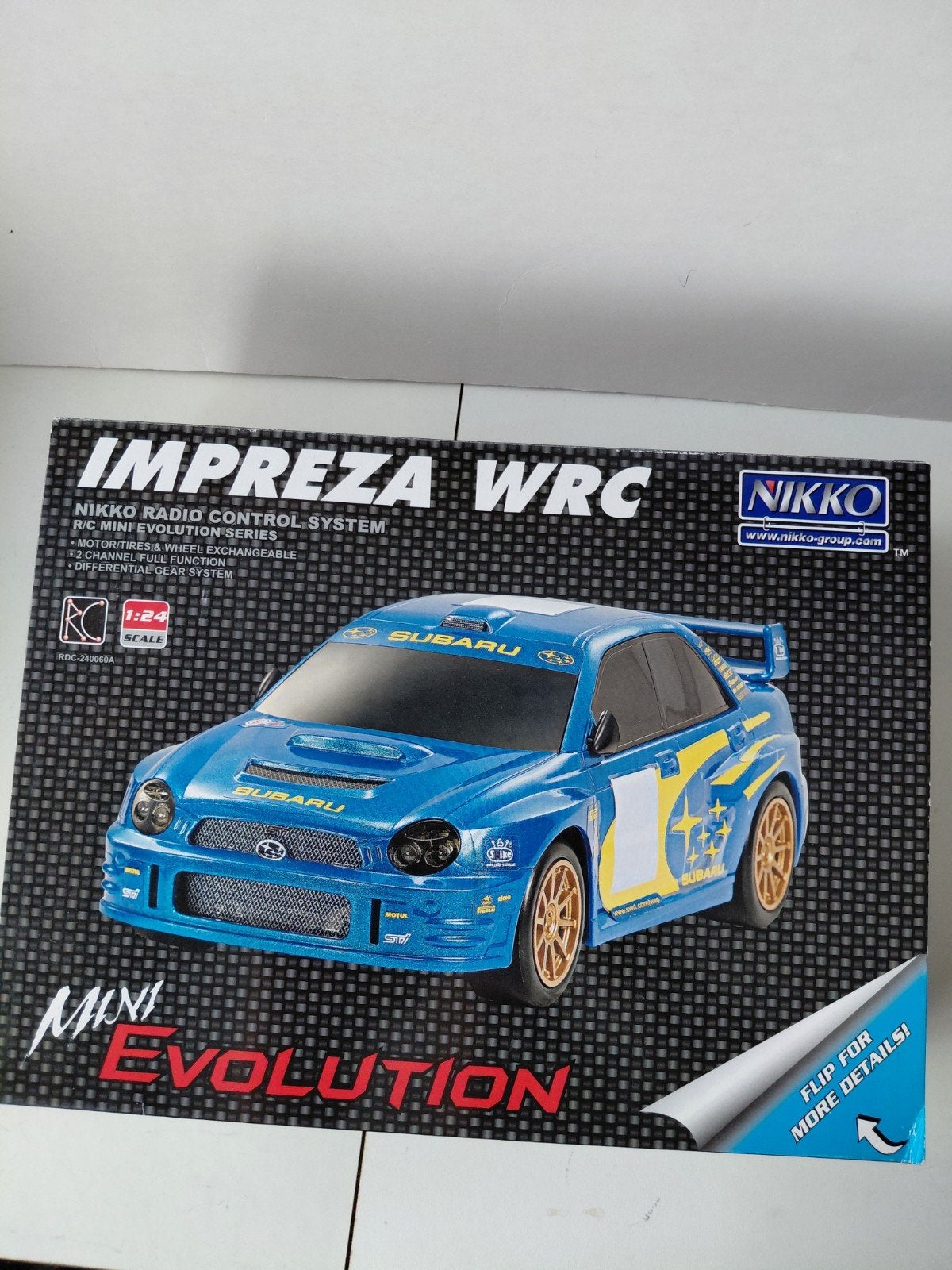Nikko rc Subaru impreza 1;24, Ophalen of Verzenden