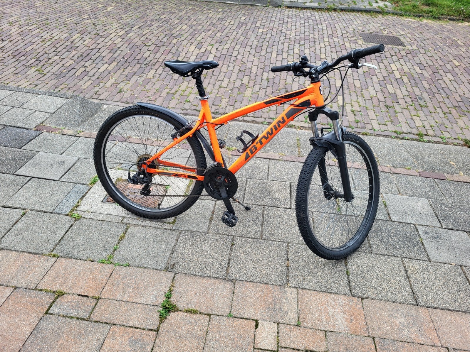 B'Twin Rockrider 340 Mountainbike Oranje, Fietsen en Brommers, Ophalen, Gebruikt, Overige merken