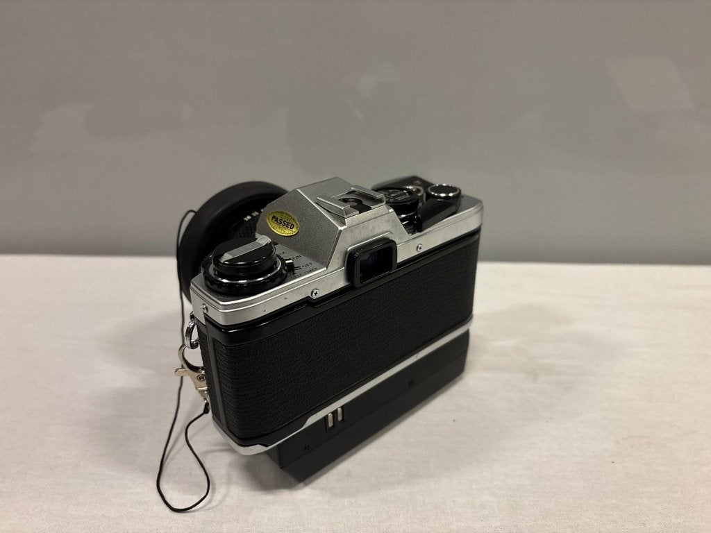Olympus OM10 spiegelreflex met winder, Panagor tele en doos, Gebruikt, Niet bekend (tweedehands product), Spiegelreflex, Olympus